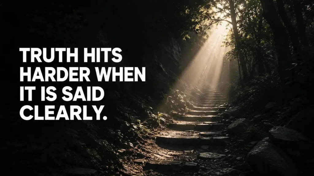 Sunlight illuminating a forest path with a motivational quote about clarity and truth.